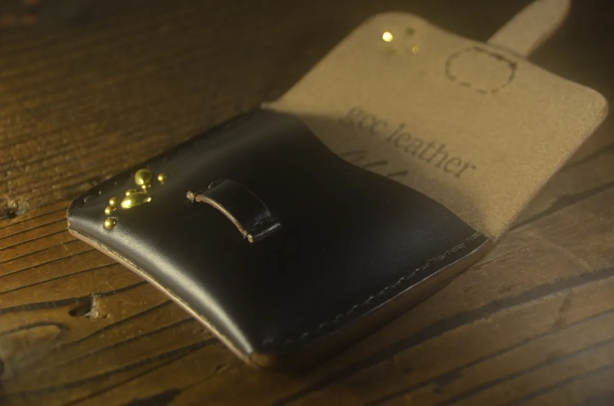 Rebel studs〈レヴェルスタッズ〉 conpact wallet